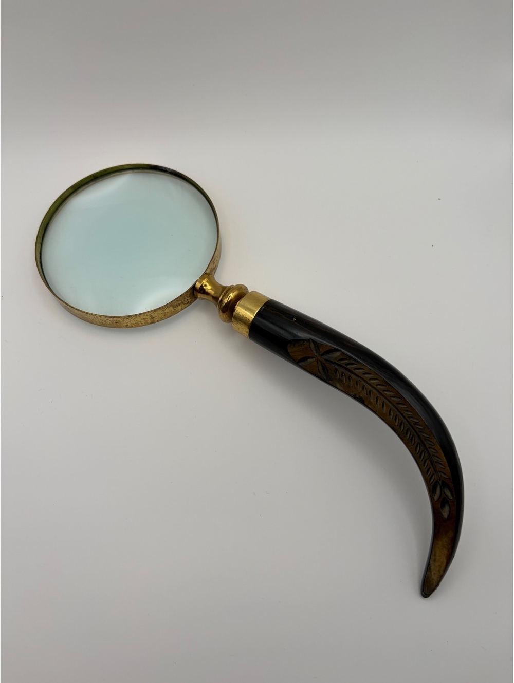Vintage Magnifying Glass with Ornate Carved Wooden Handle and Brass Frame